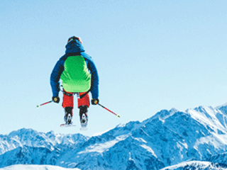 Image of a skier on a mountain (to represent the climax of a story)