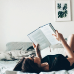 Woman Reading a Gripping Novel in Bed